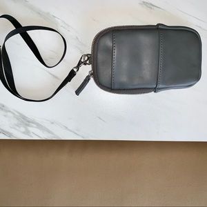 Mini travel bag with neck strap